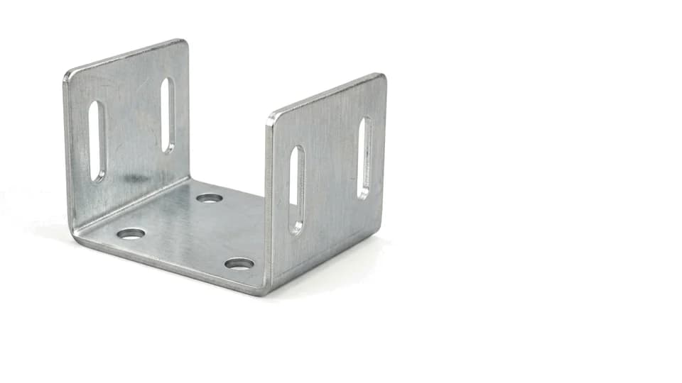 A bent sheet metal mounting bracket with slotted holes, photographed on white